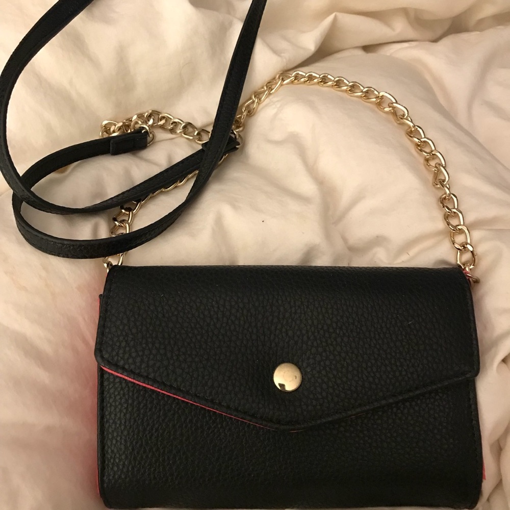 Black and hot pink cross over wallet
